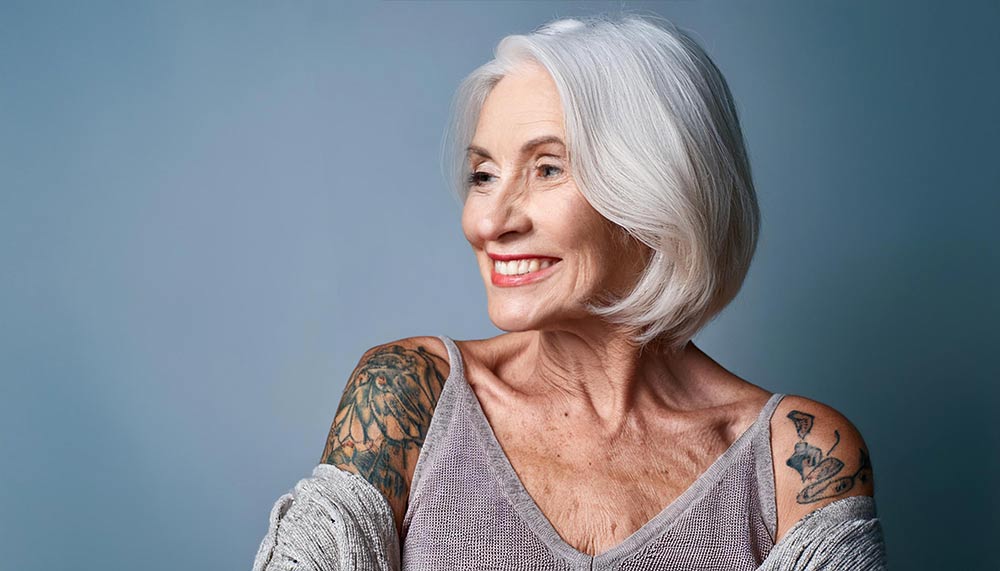 senior woman with tattoos