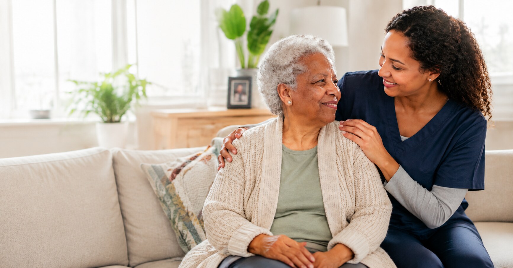 Family caregiver supporting an older adult at home in Massachusetts